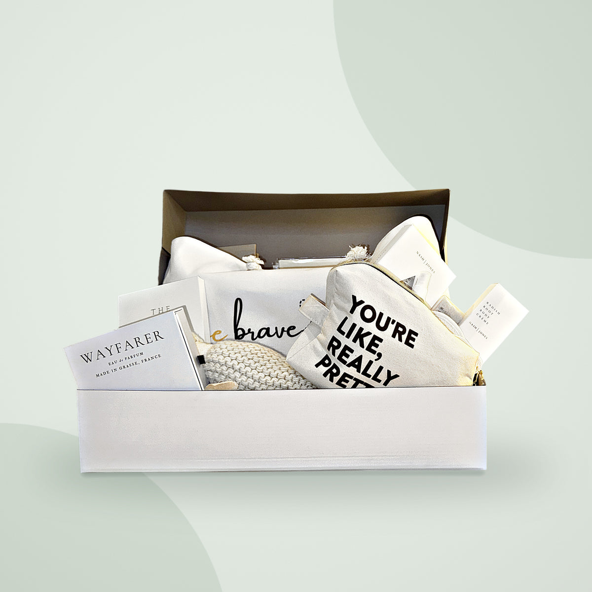 Recovery Ready Premium Kit in its gift box: knit throw, canvas pouches, body crème, journal and comfort items